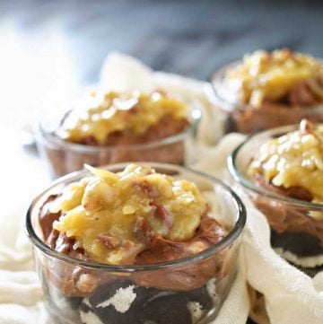 No Bake German Chocolate Cheesecake has an Oreo cookie base, simple no-bake chocolate cheesecake & topped with an easy german chocolate frosting! It's the perfect summer dessert that takes just a few minutes to make!