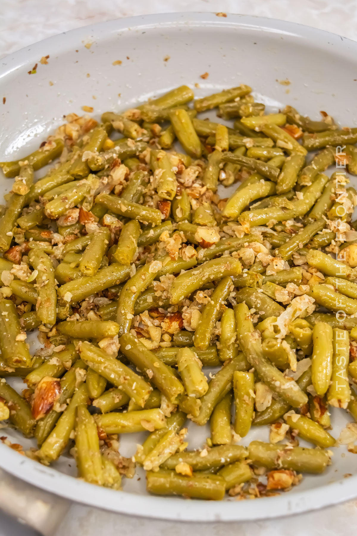 making canned veggies in a skillet