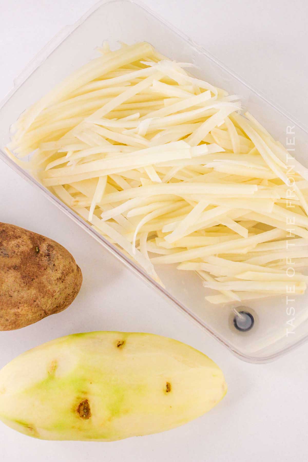 slicing the potatoes