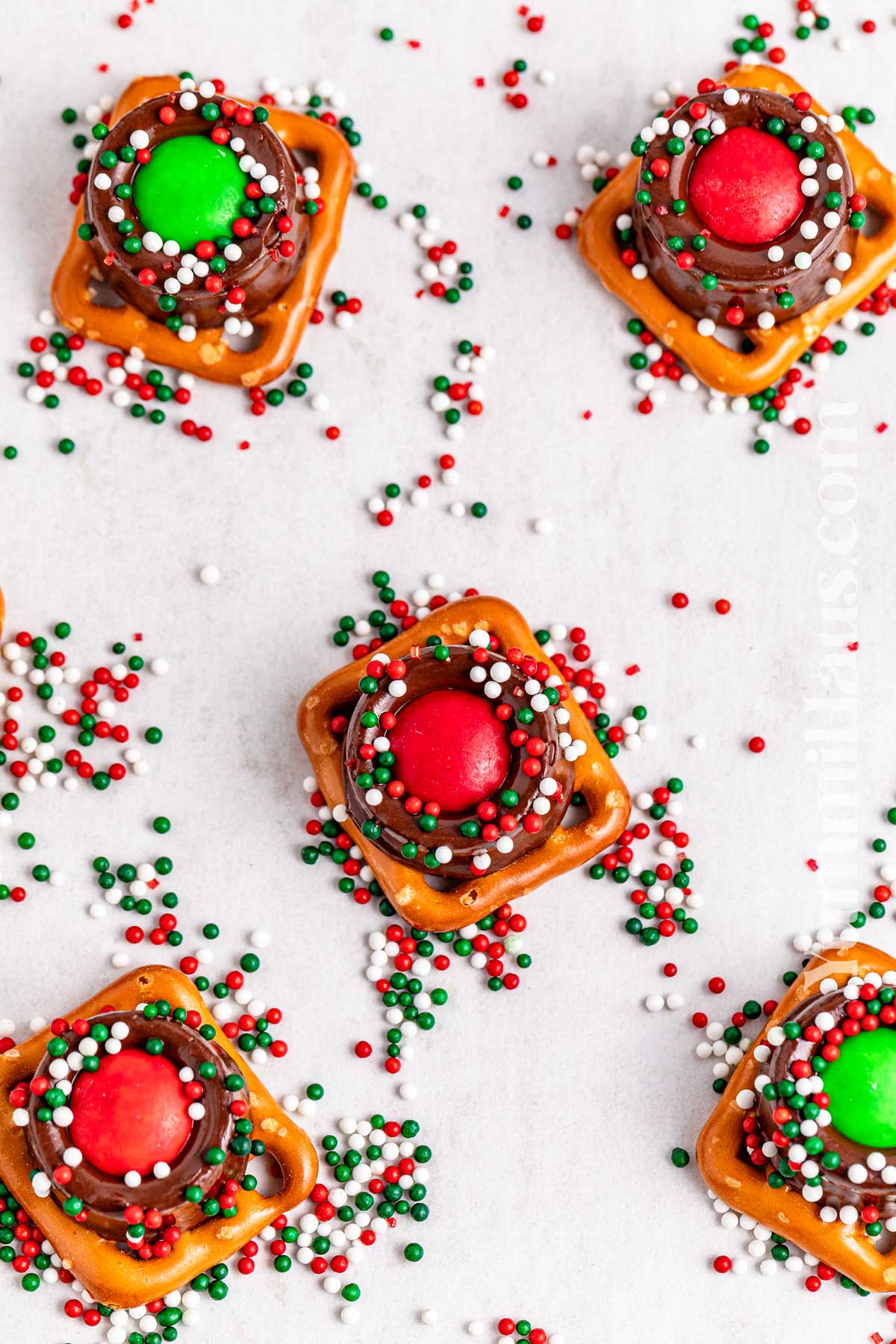 adding sprinkles to pretzel treats