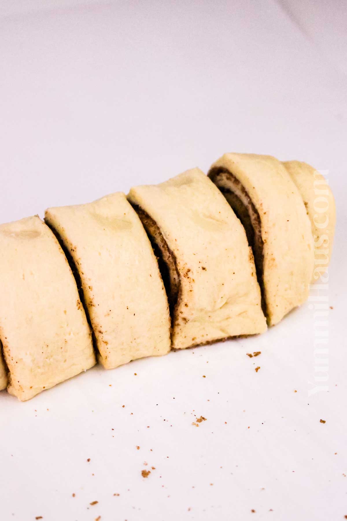 slicing the dough to fry