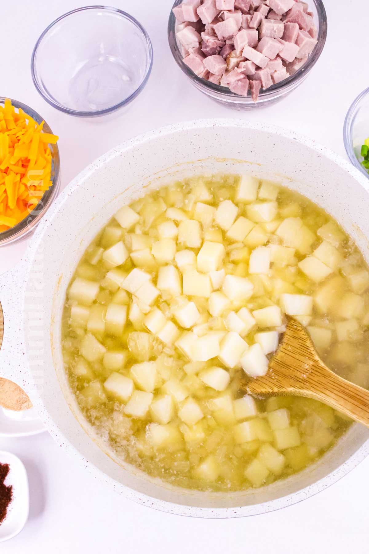 cooking the potatoes for soup