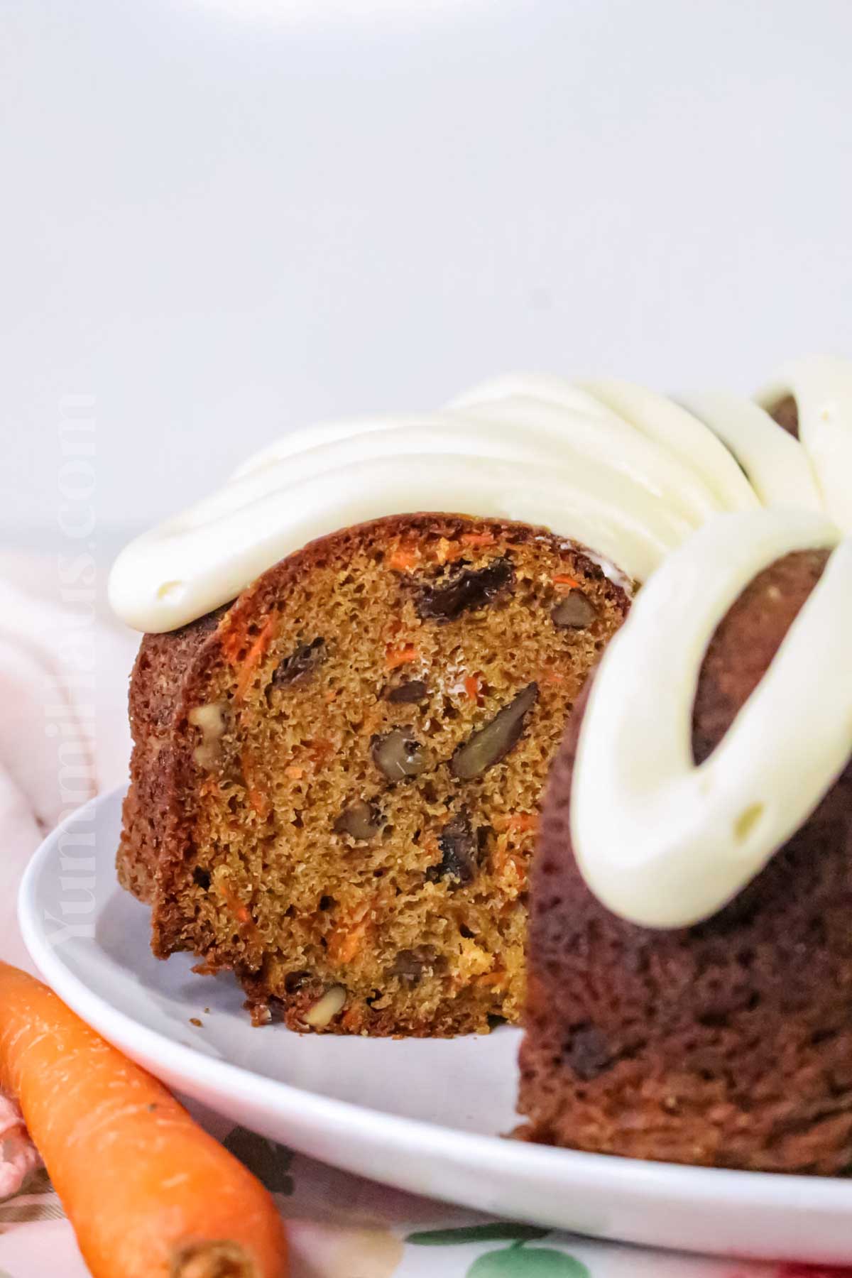 cream cheese icing on a bundt cake