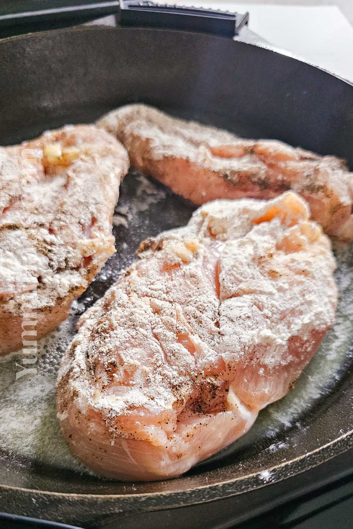 cooking chicken in a skillet